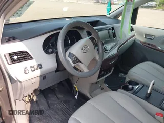 2012 Toyota Sienna XLE with VIN 5TDDK3DC6CS032969, listed as a IAAI auction lot 42423883 with 122,676 mi miles and . Bid and sale history available at DreamBid. Image 5.