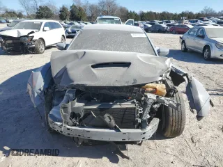2022 Dodge Charger Scat Pack with VIN 2C3CDXGJ5NH161802, listed as a Copart auction lot 54876795 with 52,837 mi miles and Salvage Title. Bid and sale history available at carsss.com. Image 5.
