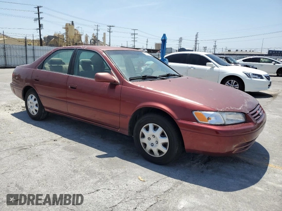 1999 Toyota Camry LE z VIN JT2BG22K6X0274398, wystawiony jako Copart lot #57263795 z przebiegiem 202 944 mil mil oraz Szkoda całkowita • Salvage title. Historia ofert i sprzedaży dostępna na DreamBid. Obrazek 4.