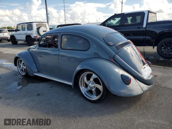 1965 Volkswagen Beetle with VIN 115467066, listed as a Copart auction lot 74195744 with Not Provided miles and Salvage Title. Bid and sale history available at DreamBid. Image 2.