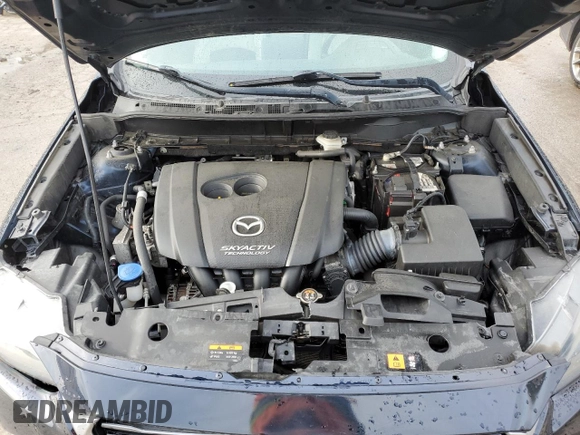 2017 Mazda CX-3 Grand Touring z VIN JM1DKFD75H0141048, wystawiony jako Copart lot #55752185 z przebiegiem 89 960 mil mil oraz Szkody całkowita. Historia ofert i sprzedaży dostępna na DreamBid. Obrazek 12.