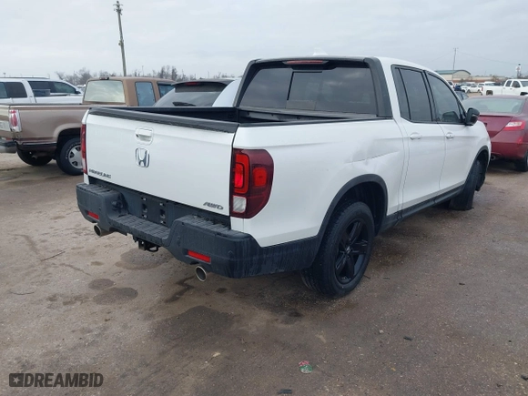 2023 Honda Ridgeline Black Edition with VIN 5FPYK3F82PB020278, listed as a IAAI auction lot 41462889 with 12,100 mi miles. Bid and sale history available at carsss.com. Image 4.