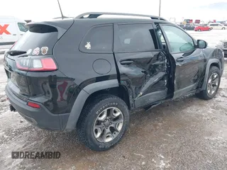 2019 Jeep Cherokee Trailhawk Elite with VIN 1C4PJMBX6KD313675, listed as a IAAI auction lot 41448924 with 51,639 mi miles. Bid and sale history available at carsss.com. Image 4.