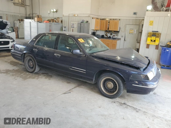 1999 Ford Crown Victoria Police с VIN 2FAFP71WXXX192272, выставлен на аукционе Copart как лот 73577384 с пробегом 278 535 миль миль и Списание • Salvage title. История ставок и продаж доступна на DreamBid. Изображение 4.