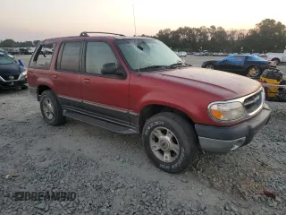 2000 Ford Explorer with VIN 1FMZU63X3YUB63135, listed as a Copart auction lot 75742324 with 168,191 mi miles and Salvage title. Bid and sale history available at DreamBid. Image 4.