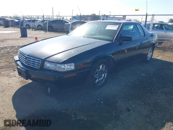 2001 Cadillac Eldorado Touring ETC z VIN 1G6ET12961B100627, wystawiony jako IAAI lot #41458966 z przebiegiem 113 620 mil mil oraz . Historia ofert i sprzedaży dostępna na DreamBid. Obrazek 2.