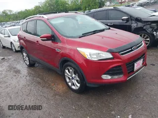 2014 Ford Escape Titanium with VIN 1FMCU0JX3EUD98815, listed as a IAAI auction lot 42078367 with 124,680 mi miles. Bid and sale history available at carsss.com. Image 1.