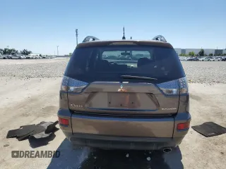 2010 Mitsubishi Outlander SE z VIN JA4AS3AW3AZ004523, wystawiony jako Copart lot #52864695 z przebiegiem 133 500 mil mil oraz Szkoda całkowita • Salvage title. Historia ofert i sprzedaży dostępna na DreamBid. Obrazek 6.