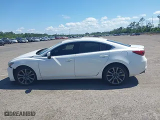 2016 Mazda Mazda6 i Grand Touring with VIN JM1GJ1W55G1443186, listed as a IAAI auction lot 42063716 with 114,263 mi miles. Bid and sale history available at carsss.com. Image 14.