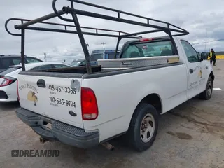 2002 Ford F-150 XL with VIN 1FTRF172X2KE34789, listed as a IAAI auction lot 42138397 with 188,960 mi miles and . Bid and sale history available at DreamBid. Image 4.