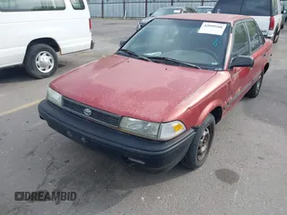 1991 Toyota Corolla z VIN 1NXAE94AXMZ209706, wystawiony jako IAAI lot #42099208 z przebiegiem 192 222 mil mil oraz . Historia ofert i sprzedaży dostępna na DreamBid. Obrazek 6.