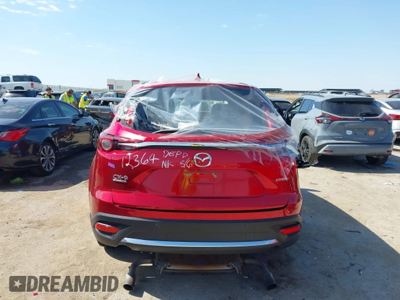 2021 Mazda CX-9 Signature with VIN JM3TCBEY9M0500122, listed as a IAAI auction lot 42252561 with 46,154 mi miles and . Bid and sale history available at DreamBid. Image 16.