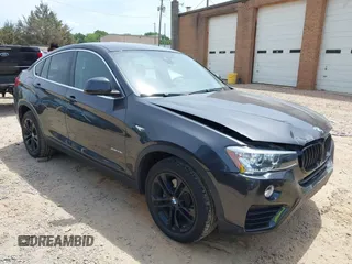 2017 BMW X4 xDrive28i with VIN 5UXXW3C34H0T80023, listed as a IAAI auction lot 42161762 with 92,044 mi miles and . Bid and sale history available at DreamBid. Image 1.