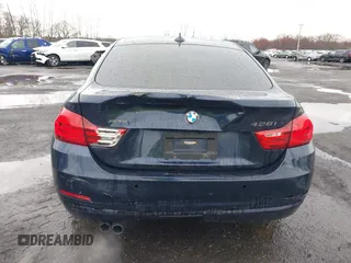 2016 BMW 4 Series 428i xDrive with VIN WBA4C9C59GG137067, listed as a IAAI auction lot 41913733 with 104,378 mi miles and . Bid and sale history available at carsss.com. Image 19.