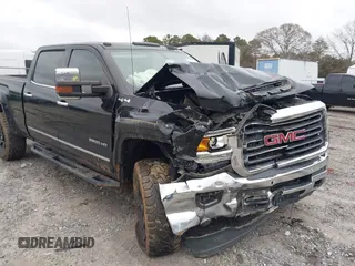 2018 GMC Sierra 2500HD SLT with VIN 1GT12TEY9JF279932, listed as a IAAI auction lot 41583208 with 70,465 mi miles. Bid and sale history available at carsss.com. Image 6.