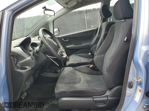 2010 Honda Fit Sport with VIN JHMGE8H64AC032634, listed as a Copart auction lot 61795825 with 143,593 mi miles and Salvage title. Bid and sale history available at DreamBid. Image 7.