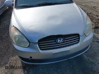 2006 Hyundai Accent GLS with VIN KMHCN46C46U012561, listed as a IAAI auction lot 41750609 with 286,770 mi miles. Bid and sale history available at carsss.com. Image 6.