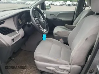 2015 Toyota Sienna L with VIN 5TDZK3DCXFS620092, listed as a Copart auction lot 61606095 with 130,624 mi miles and Salvage title. Bid and sale history available at DreamBid. Image 7.