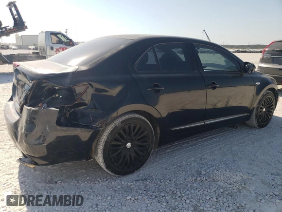 2011 Suzuki Kizashi SE z VIN JS2RE9A34B6111601, wystawiony jako Copart lot #75945784 z przebiegiem 128 926 mil mil oraz Szkoda całkowita • Salvage title. Historia ofert i sprzedaży dostępna na DreamBid. Obrazek 3.