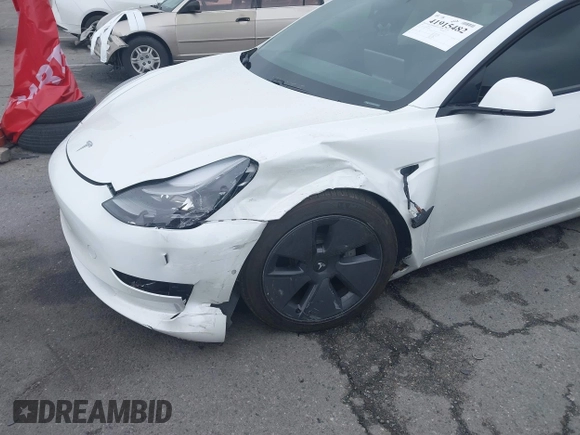 2021 Tesla Model 3 Long Range with VIN 5YJ3E1EB6MF878957, listed as a IAAI auction lot 41915482 with 59,578 mi miles. Bid and sale history available at carsss.com. Image 6.