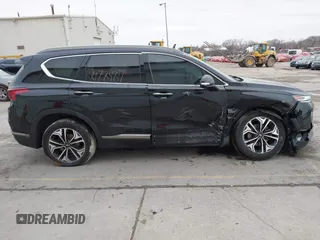 2019 Hyundai Santa Fe Ultimate with VIN 5NMS5CAA8KH019109, listed as a IAAI auction lot 41120391 with 101,829 mi miles and . Bid and sale history available at DreamBid. Image 13.