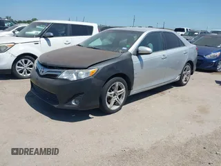 2014 Toyota Camry L with VIN 4T1BF1FK0EU419046, listed as a IAAI auction lot 41981785 with 169,453 mi miles. Bid and sale history available at carsss.com. Image 2.