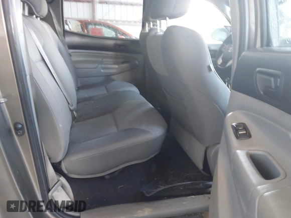 2014 Toyota Tacoma with VIN 3TMMU4FN4EM072128, listed as a IAAI auction lot 42479725 with 287,877 mi miles and . Bid and sale history available at DreamBid. Image 8.
