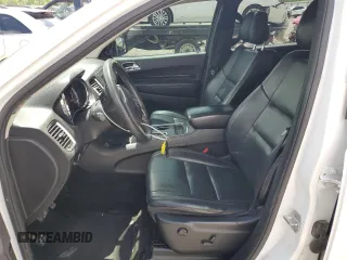 2013 Dodge Durango Crew with VIN 1C4RDJDGXDC695231, listed as a Copart auction lot 56934625 with 156,858 mi miles and Salvage title. Bid and sale history available at DreamBid. Image 7.