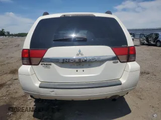 2011 Mitsubishi Endeavor SE z VIN 4A4JN3ASXBE022822, wystawiony jako Copart lot #57174715 z przebiegiem 149 769 mil mil oraz Czysty tytuł • Clean title. Historia ofert i sprzedaży dostępna na DreamBid. Obrazek 6.