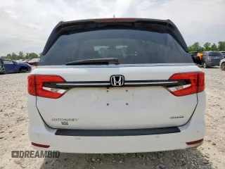 2023 Honda Odyssey Touring с VIN 5FNRL6H8XPB001311, выставлен на аукционе Copart как лот 56924345 с пробегом 77 736 миль миль и Списание • Salvage title. История ставок и продаж доступна на DreamBid. Изображение 6.