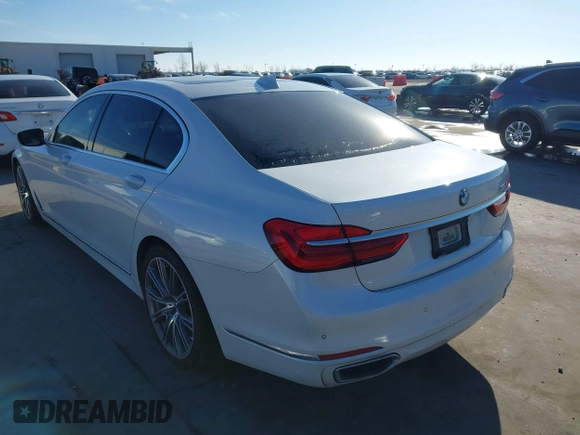 2018 BMW 7 Series 750i with VIN WBA7F0C57JGM23667, listed as a IAAI auction lot 41581035 with 113,140 mi miles and . Bid and sale history available at DreamBid. Image 3.