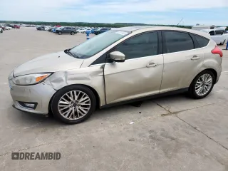 2017 Ford Focus Titanium with VIN 1FADP3N22HL266807, listed as a Copart auction lot 57071635 with 172,857 mi miles and Salvage title. Bid and sale history available at DreamBid. Image 1.