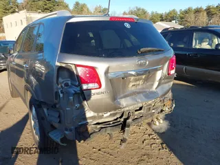 2012 Kia Sorento LX with VIN 5XYKT3A65CG240227, listed as a IAAI auction lot 41009682 with 276,573 mi miles. Bid and sale history available at carsss.com. Image 6.