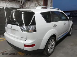 2009 Mitsubishi Outlander SE with VIN JA4LS31W49Z000940, listed as a IAAI auction lot 42044608 with 127,990 mi miles. Bid and sale history available at carsss.com. Image 4.