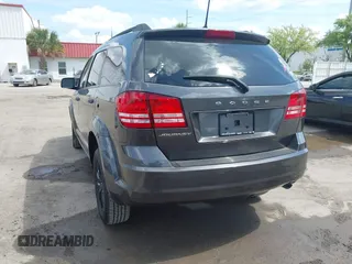 2020 Dodge Journey SE Value with VIN 3C4PDCAB1LT279048, listed as a IAAI auction lot 41810067 with 68,618 mi miles and . Bid and sale history available at carsss.com. Image 3.