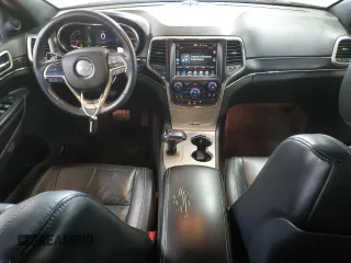 2014 Jeep Grand Cherokee Limited with VIN 1C4RJFBG7EC214913, listed as a Copart auction lot 60555845 with 148,699 mi miles and Salvage title. Bid and sale history available at DreamBid. Image 8.