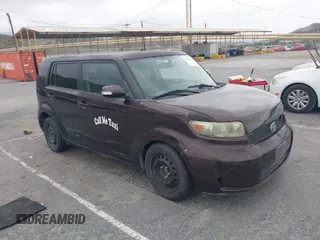 2009 Scion xB with VIN JTLKE50E291081243, listed as a IAAI auction lot 42033327 with 263,903 mi miles. Bid and sale history available at carsss.com. Image 1.