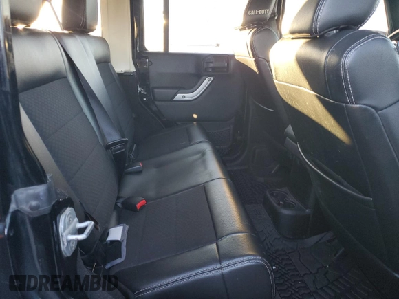 2012 Jeep Wrangler Unlimited Rubicon with VIN 1C4HJWFG1CL221083, listed as a Copart auction lot 80081654 with 163,912 mi miles and Salvage title. Bid and sale history available at DreamBid. Image 10.