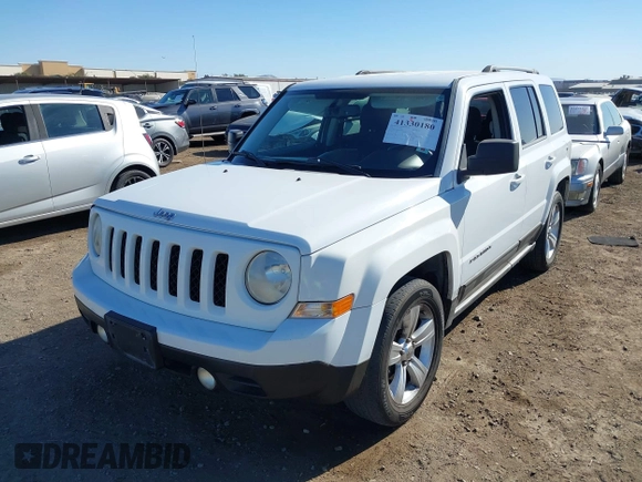 2011 Jeep Patriot Latitude with VIN 1J4NT1GB0BD105816, listed as a IAAI auction lot 41330180 with 143,431 mi miles. Bid and sale history available at carsss.com. Image 2.