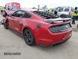 2020 Ford Mustang EcoBoost with VIN 1FA6P8TH4L5189982, listed as a IAAI auction lot 42065871 with 67,942 mi miles. Bid and sale history available at carsss.com. Image 3.
