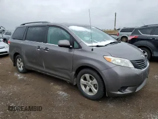 2011 Toyota Sienna with VIN 5TDZK3DC9BS108091, listed as a Copart auction lot 49172735 with 398,819 mi miles and Salvage Title. Bid and sale history available at carsss.com. Image 4.
