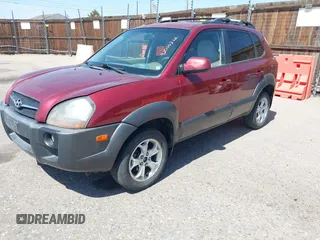 2009 Hyundai Tucson Limited with VIN KM8JN72D79U933958, listed as a IAAI auction lot 42006262 with 143,502 mi miles. Bid and sale history available at carsss.com. Image 2.