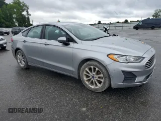 2020 Ford Fusion SE z VIN 3FA6P0HD0LR256243, wystawiony jako Copart lot #56513215 z przebiegiem 59 996 mil mil oraz Szkoda całkowita • Salvage title. Historia ofert i sprzedaży dostępna na DreamBid. Obrazek 4.