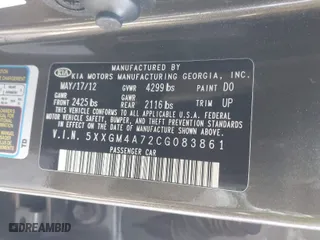 2012 Kia Optima LX with VIN 5XXGM4A72CG083861, listed as a IAAI auction lot 41909434 with 124,526 mi miles. Bid and sale history available at carsss.com. Image 9.