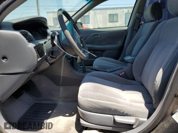 2001 Toyota Camry CE z VIN 4T1BG22K81U783489, wystawiony jako Copart lot #57893115 z przebiegiem 154 352 mil mil oraz Czysty tytuł • Clean title. Historia ofert i sprzedaży dostępna na DreamBid. Obrazek 7.