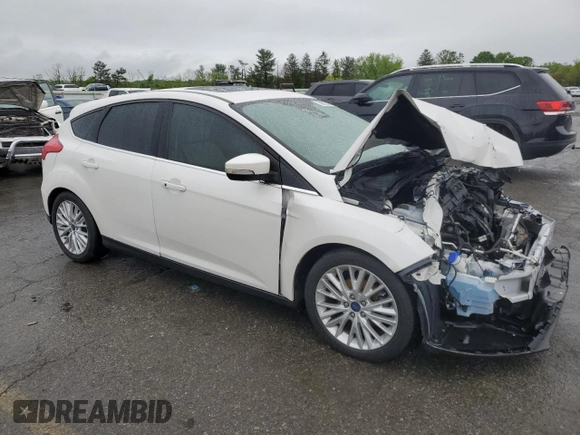 2017 Ford Focus Titanium с VIN 1FADP3N23HL244301, выставлен на аукционе Copart как лот 56625555 с пробегом 96 304 миль миль и Списание • Salvage title. История ставок и продаж доступна на DreamBid. Изображение 4.