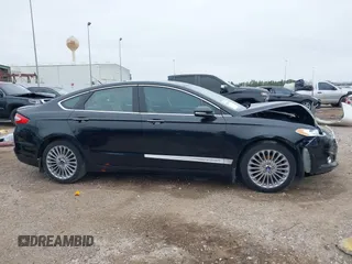 2014 Ford Fusion Titanium with VIN 3FA6P0K9XER364392, listed as a IAAI auction lot 41642439 with 130,302 mi miles and . Bid and sale history available at DreamBid. Image 12.