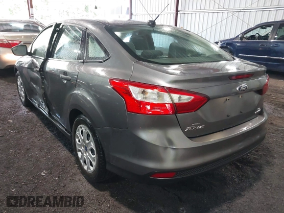 2012 Ford Focus SE with VIN 1FAHP3F21CL408430, listed as a IAAI auction lot 42286632 with 140,387 mi miles and . Bid and sale history available at DreamBid. Image 3.