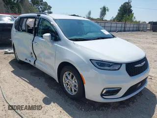 2022 Chrysler Pacifica Touring L with VIN 2C4RC1BG4NR191644, listed as a IAAI auction lot 41979011 with 84,789 mi miles and . Bid and sale history available at DreamBid. Image 1.