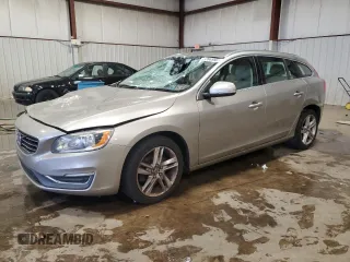 2015 Volvo V60 T5 Drive-E Premier with VIN YV140MEK7F1261304, listed as a Copart auction lot 81284994 with 124,505 mi miles and Salvage Title. Bid and sale history available at carsss.com. Image 1.